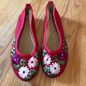 Floral red dress flats.